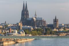 Hot air balloon over Cologne with City Hall Tower, Kölner Dom, and Great St. Martin Church