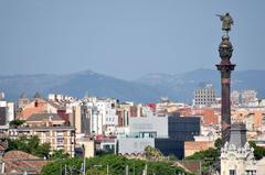 panoramic view of Barcelona cityscape with prominent buildings and coastline