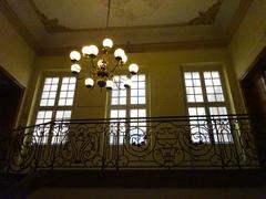 Interior view of a natural history museum with a staircase