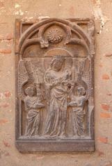 Stone relief of Virgin Mary and child between two angels at Campo Santo in Perpignan