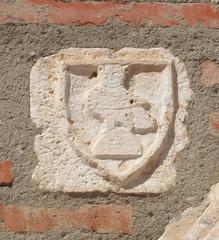 Medieval marble relief depicting an owl at Campo Santo in Perpignan