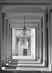 Black and white photo of a portico from an Italian monument