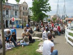 guests having a picnic near Tidal Wave pool at Thorpe Park