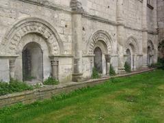 Basilica of Saint-Eutrope in Saintes with disc-shaped steles and capitals around windows