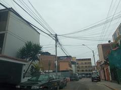 Tangled electric cables on a utility pole