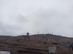 Municipal sign on the fence of Huaca Cruz de Armatambo