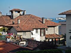 panoramic view of Baveno with Lake Maggiore and the surrounding Alps