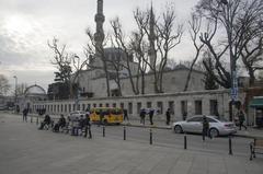 Yeni Valide Mosque complex with open-air grave and cage-like structure to the left