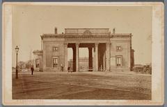 Haarlemmerpoort at Haarlemmerplein with old Willemspoort station in the background, photo by A.T. Rooswinkel, circa 1868