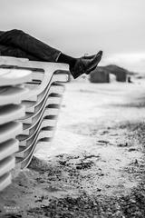 crossed feet on a beach in Marseille