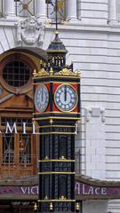 Little Ben clock tower against Victoria Palace Theatre frontage in London