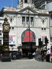 Little Ben clock tower and Victoria Palace Theatre in London