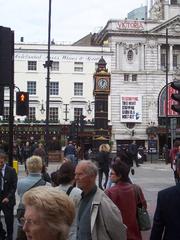 Little Ben clock with Victoria Palace theatre behind