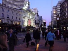 Pavement and pedestrian crossing at Victoria Street in Westminster, London with Little Ben clock tower