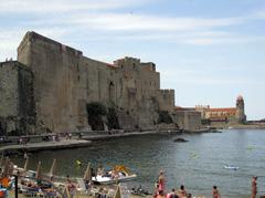 El Castell Reial and Església dels Àngels in Port d'Avall