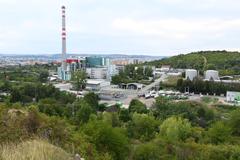 landscape view of Brno with an incineration plant in the foreground