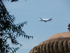 aeroplane flying above Lingaraj Temple