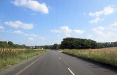 A4010 north of Flinthall Farm, rural road with trees and fields