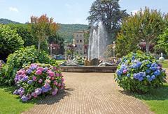 Waterfront Park in Stresa, Italy with beach area and pathway