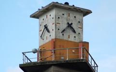 the clock tower of Dinan's railway station in Brittany, France