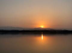 Sunrise over Sukhna Lake with Himalayan foothills