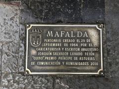 Plate of Mafalda comic figure statue in Oviedo, Spain