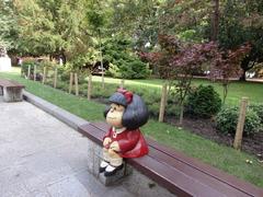 Mafalda in San Francisco field watching swans and ducks