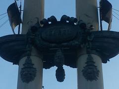 Monument to Columbus in Murillo Gardens Seville, detail of ship prows and plaque with Queen Isabella's name