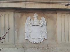 Shield of the Catholic Monarchs at the base of the Columbus monument in Seville