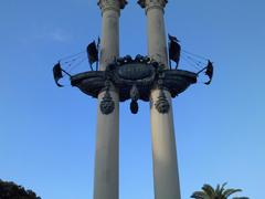 bronze sculpture of the bows of two caravels in the Columbus monument