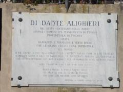 Plaque on an entrance door with Dante's verses mentioning Fiorenzuola