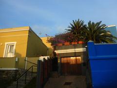 Bo-Kaap neighborhood in Cape Town with colorful houses and cobblestone street