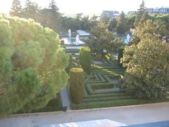 Jardines in Madrid, scenic view, well-manicured greenery, serene atmosphere