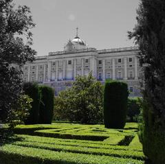 View from the gardens with green lawns and trees