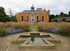 Scenic garden pond with lush greenery