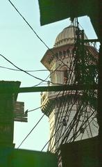 Mahabbat Khan Mosque with minaret and cables in Peshawar