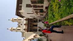 Hanging Church in Cairo with intricate architecture and people in the foreground