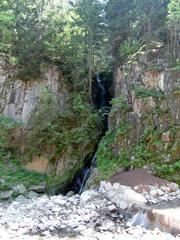 Cascata del Lupo waterfall surrounded by greenery