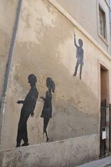 Marseille France wall with three silhouettes in Le Panier