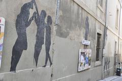 Marseille walls with eight silhouettes in Le Panier quarter