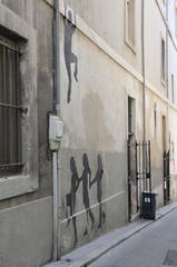 Marseille France wall with seven silhouettes in Le Panier