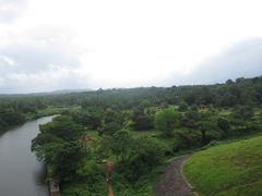 Kanjirapuzha Dam with surrounding garden and view of Vakkodan Hill