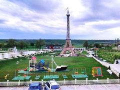 amusement park with rides and people enjoying