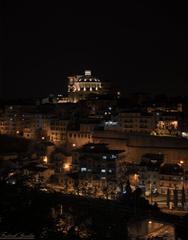 night view of the town with the imposing Collegiate Church of Santa Maria Maggiore