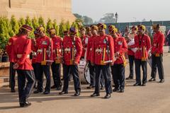 Band performing at India Gate with monumental arch in the background