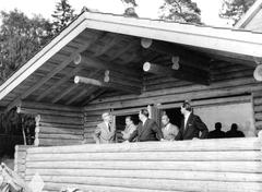 President Urho Kekkonen on the Tamminiemi sauna terrace in 1956 with Jussi Lappi-Seppälä and others