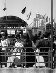 People at the entrance of Plaza de Castilla Metro and Circo Atlas in Madrid, 1969