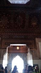 Bahia Palace courtyard with intricate tilework and lush gardens in Marrakech