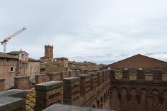 Base of Torre del Mangia in Siena, Italy on April 5, 2015