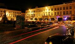 Place de Luxembourg at night with Berlin Wall sections on display